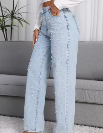 Damskie spodnie jeansowe z koralikami